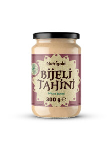 Nutrigold white tahini paste in a glass jar of 300g